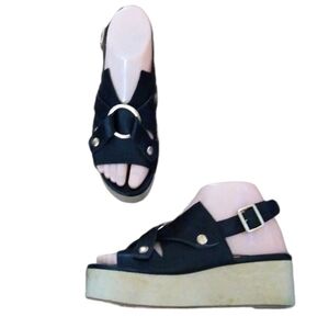 Jaggar Black‎ & Gold Grommet Leather Platforms